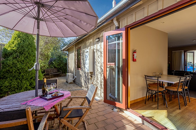 Patio area of two bedroom - ground floor room at Settlers Boutique Motel - Hanmer Springs motel